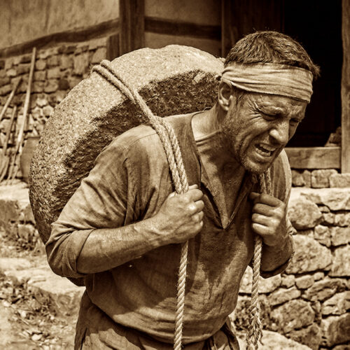 Man with millstone Square